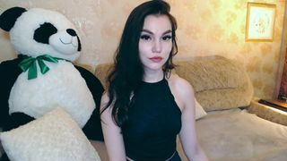 annie_moon_ pretty woman undressed in front of the camera and masturbates in the chair