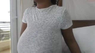 kat08 the insistent babe caresses her charms