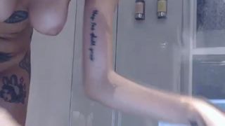 mariewana black-haired bitch caresses her charms