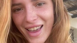 Bella lustful woman fucks vagina with phallus