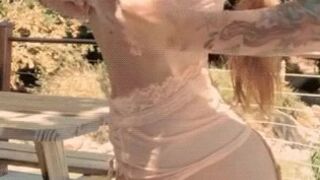 coconutkitty manyvids onlyfans busty woman posing in panties