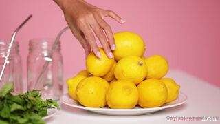 putri_cinta onlyfans busty  cam girl  caresses her lips.