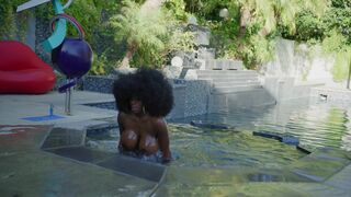 ebony mystique beauty fucks with a rubber doll