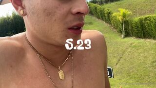 aprilvixen busty  cam girl  caresses her lips.