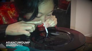 manyvids Asian CumDump attractive chick diligently licks dildo