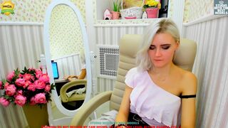 alexis_coy openwork blonde erotically moving in front of the camera