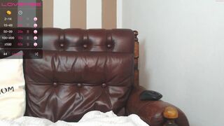 krystal_web busty  cam girl  caresses her lips.