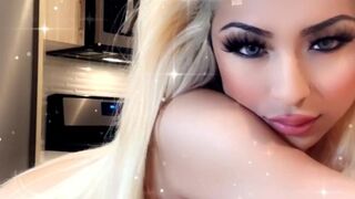 Elena Genevinne  shy chick caresses big tits