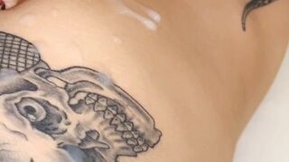 Tiffany Towers writes pen on boobs and ass