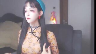 cute_dami dancing near the christmas tree