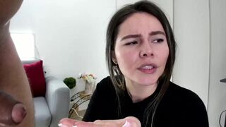 xhxoxtxsxex busty cam girl caresses her lips.