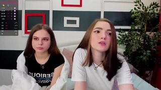 sophie__white busty  cam girl  caresses her lips.