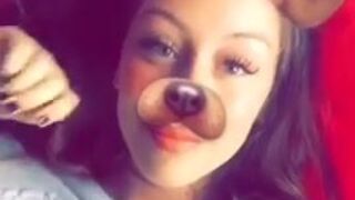 cherubesque Sexy baba in glasses coolly playing pranks with a sex toy