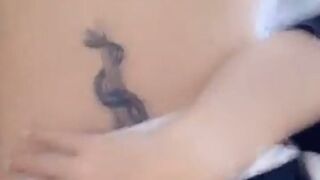Layna Boo Slut caresses his cap