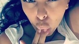 Kira Queen Beauty caresses her tits and pussy