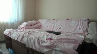 issabelle Playful woman caresses shaved pussy