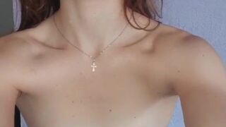 Grace_t Wonderful mother pulls the cap with her fingers