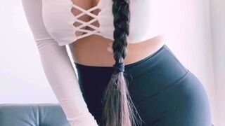 Asiankitten Busty Shmara caresses her lips.