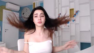 stiret charming shows off her tits.