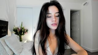 winonaoak black-haired curl plays with sex toy