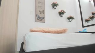 petite_ cute brunette caresses her charms