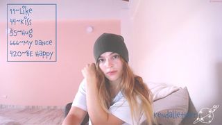 kendalltyler sexy girl in glasses coolly playing pranks with a sex toy